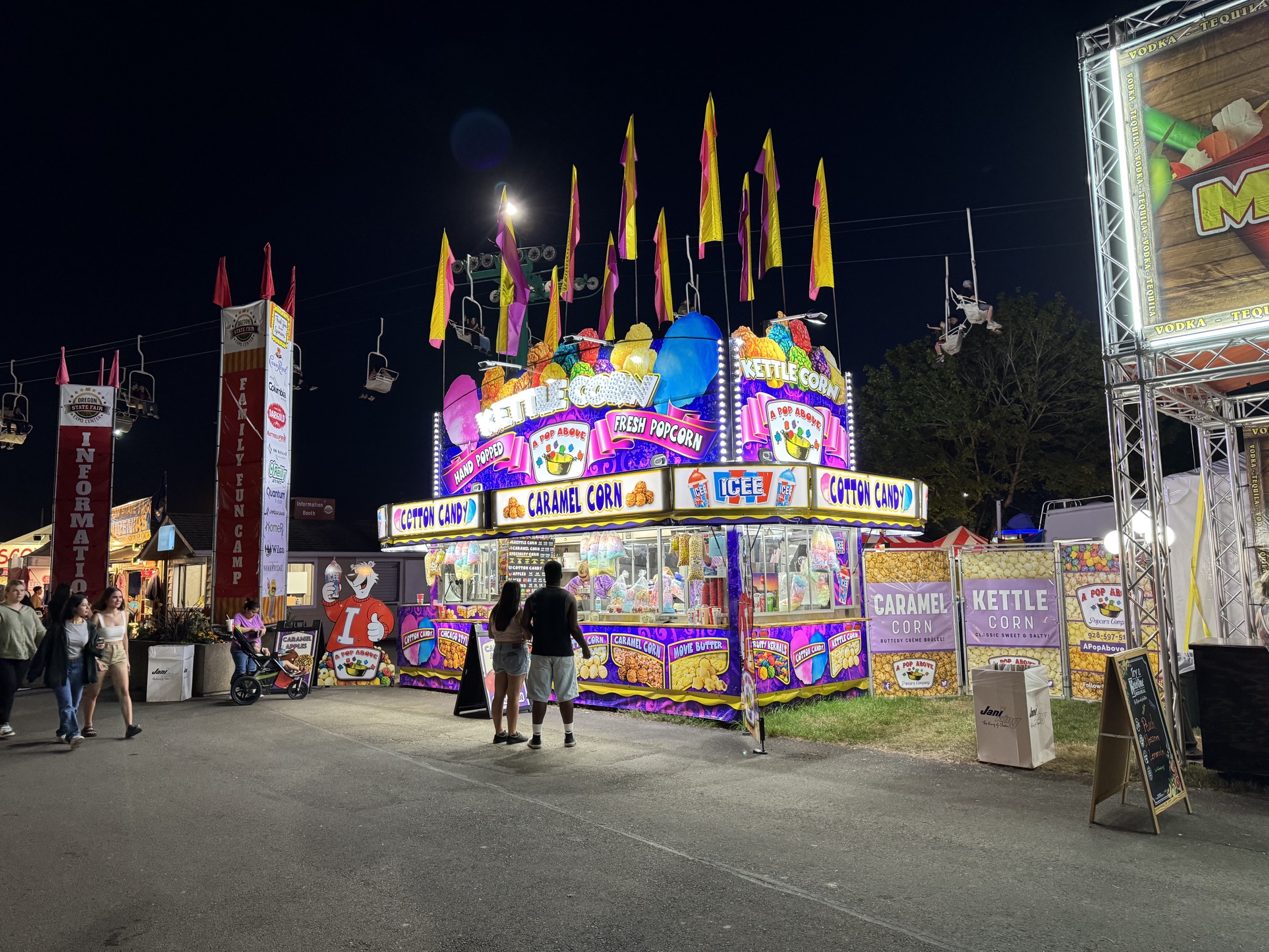A Pop Above’s illuminated flagship concession at the Oregon State Fair